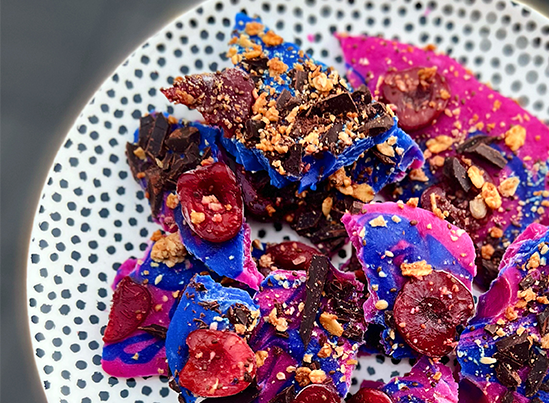 colourful frozen yogurt bark on a plate