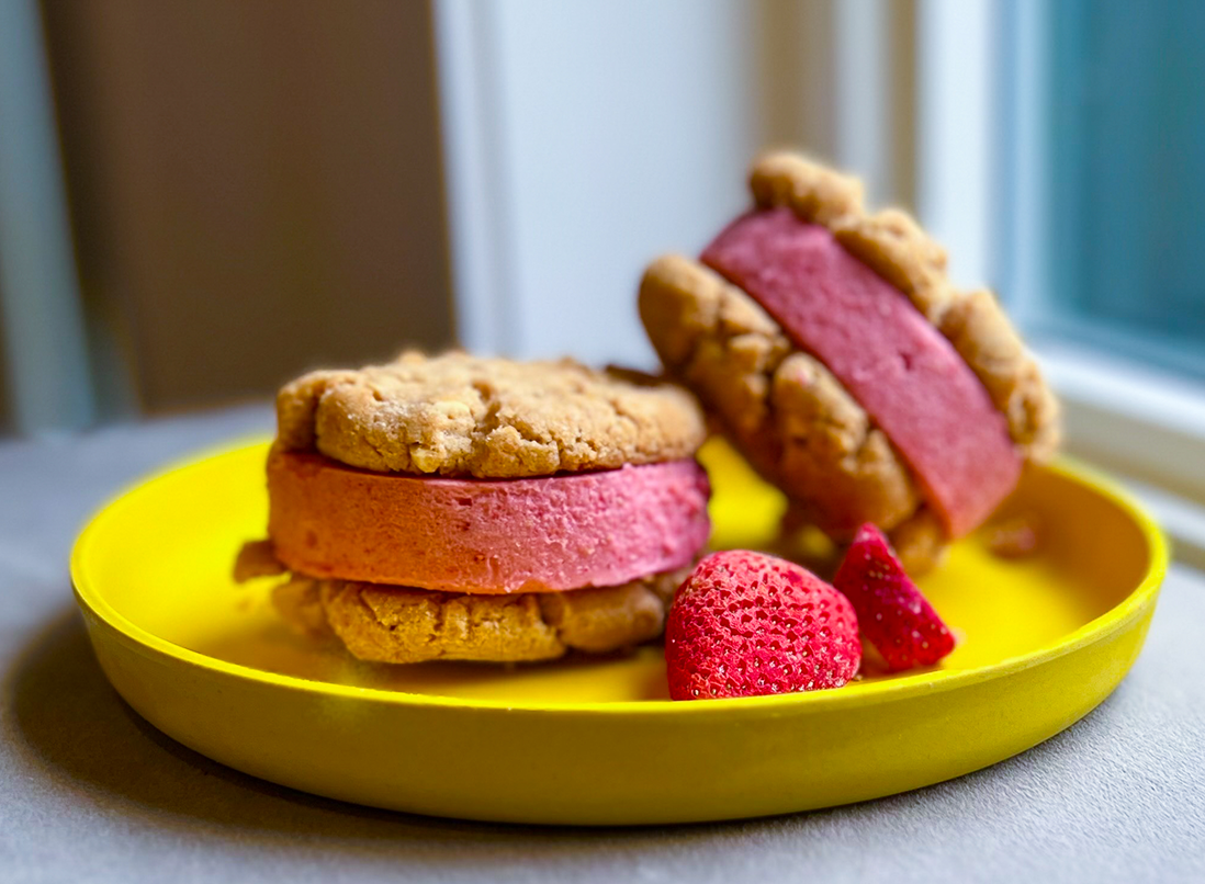 PB&J ice cream sandwiches on a bright yellow plate.